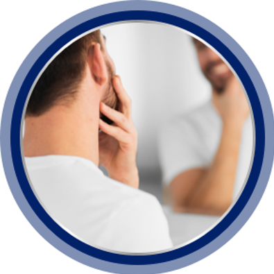 man touching face